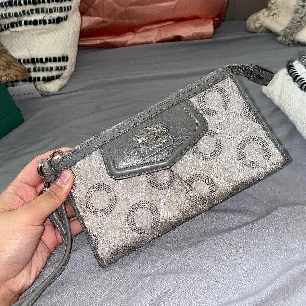 coach wristlet wallet. fits an iphone 14 and cards inside. lightly worn
